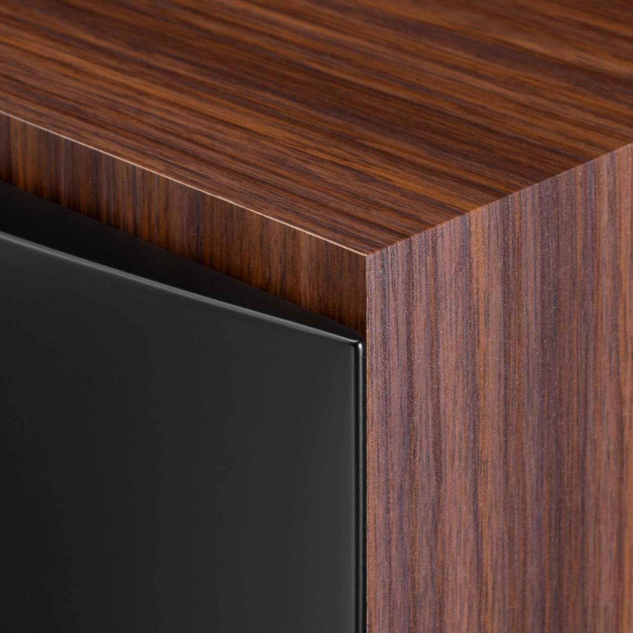 The Swan D8.1MKII are three-way passive bookshelf speakers with a 150W output, designed for faithful and natural music reproduction. The combination of a sophisticated design and high-quality drivers delivers a balanced, detailed, and spatially rich sound, suitable for the discerning home listener. Their high-quality craftsmanship is complemented by gold-plated, pure copper speaker terminals, which ensure reliable and stable signal transmission. Three-way passive bookshelf speakers with a total output of 150W Patented HiVi isodynamic ribbon tweeter Tweeter diaphragm made of Kapton and copper composite Separate 50mm mid-range driver Swan D8.1MKII with an 8" mid-bass driver for firm, controlled bass Three-way crossover for a seamless blend between the individual bands Gold-plated, pure copper speaker terminals Suitable for home Hi-Fi and stereo systems Swan's three-way speaker crossover for smooth full-spectrum reproduction The speaker is equipped with a three-way crossover that helps to ensure a smooth transition between the individual frequency bands and reduces the unnatural transitions typical of simpler designs. The result is smooth, realistic and authentic reproduction of spoken word, vocals and complex musical recordings. HiVi isodynamic ribbon tweeter The Swan D8.1MKII speaker features a patented HiVi isodynamic ribbon tweeter with a diaphragm made of a Kapton and copper composite. Thanks to its extremely low weight, it excels with a fast response, high precision and the ability to reproduce even the finest details. It delivers the sounds of instruments such as the triangle, flute or string instruments with clarity, lightness and natural airiness. Separate mid-range driver and 8" woofer for dynamic bass A separate 50mm driver handles the reproduction of the mid-range, contributing to the fullness, intelligibility and natural delivery of voices and instruments. Low frequencies are provided by an 8" mid-bass driver, delivering firm, dynamic and well-controlled bass. Thanks to the synergy of all the drivers, the D8.1MKII offers a harmonically balanced sound across the entire 38–20,000Hz frequency range.