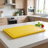 Gastro Plastic cutting board 53x32,5x2 cm GN 1/1, with groove, yellow - Cutting Board