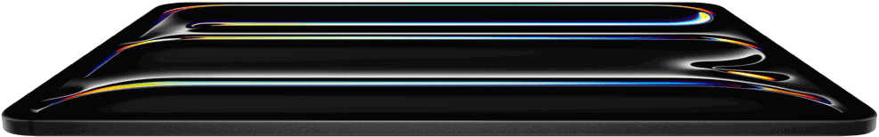 iPad Pro, pohled zepředu, vesmírně černá barva, tělo z&nbsp;hliníku a&nbsp;skla, tenký profil, nakloněný dozadu na displeji se zobrazuje grafika s&nbsp;pestrobarevnými čárami