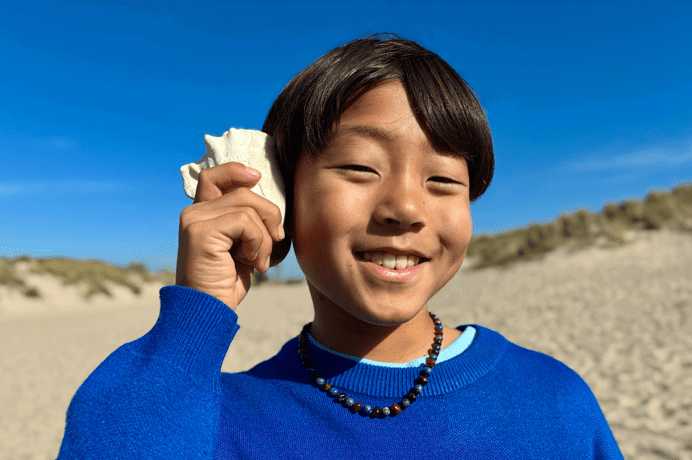 Fotka pořízená 48Mpx Fusion fotoaparátem, použití portrétů další generace, zaostření na obličej člověka