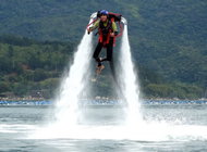 Jetpack - flying above the water surface - Printed Voucher