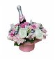 Virágos doboz rózsaszín boglárkákból, Lindt bonbonokkal és pezsgővel 35 cm - Ajándék kosár
