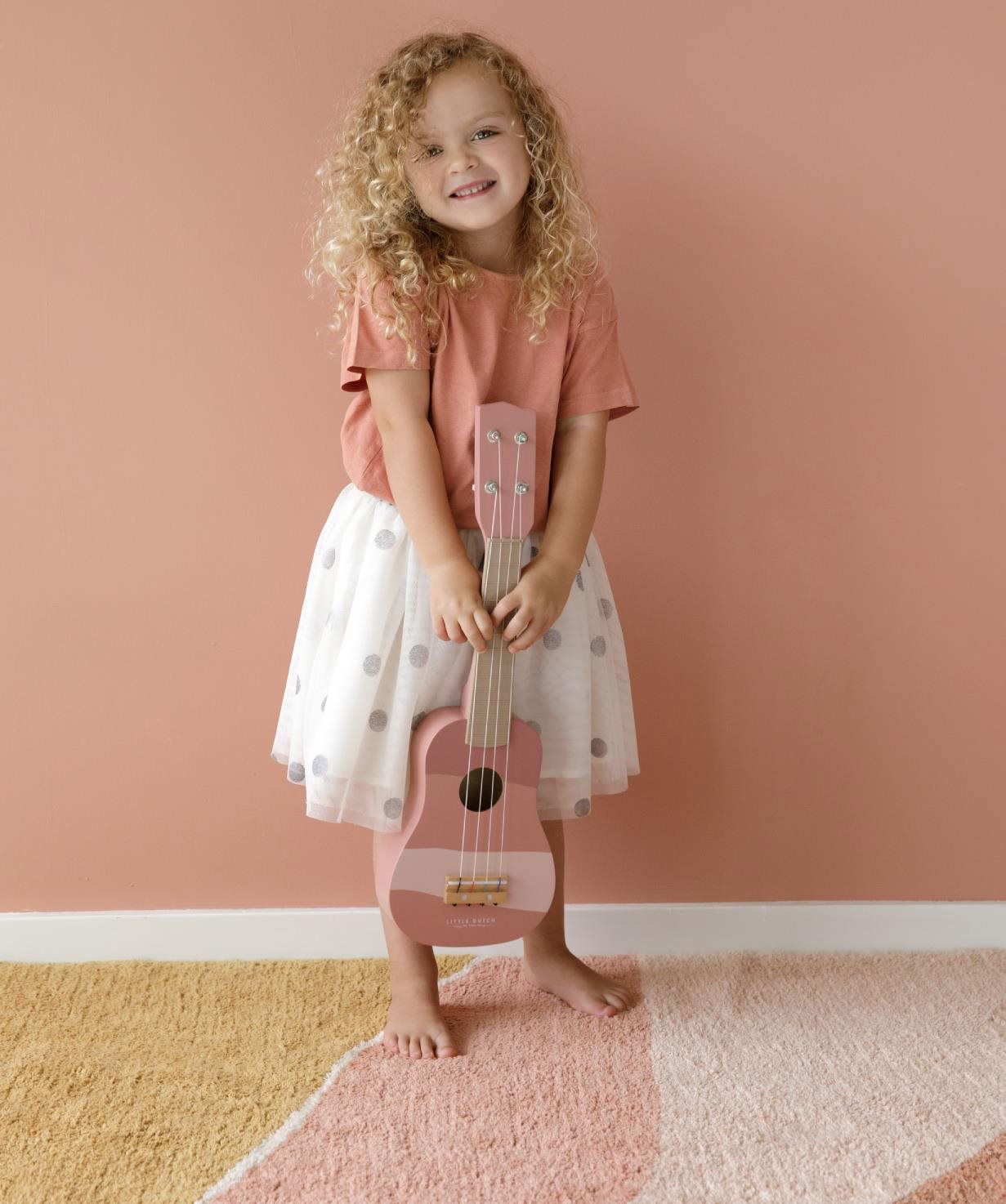 Pink wooden guitar hotsell
